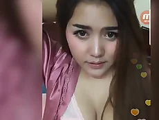Video chat captures Asian girls clevage in steamy action | action,asian,chat,girl